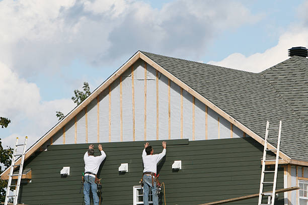 Professional Emergency Siding Repair technician working in Hunker, PA